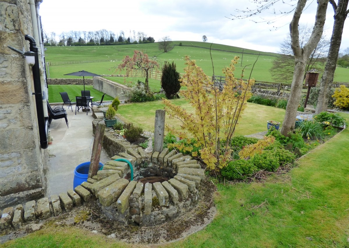 The garden, with space for al fresco dining, and secure for children and dogs